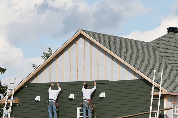 Professional Vinyl Siding technician working in The Plains, OH